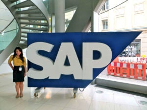 Photo of Jessica Pearson with SAP sign