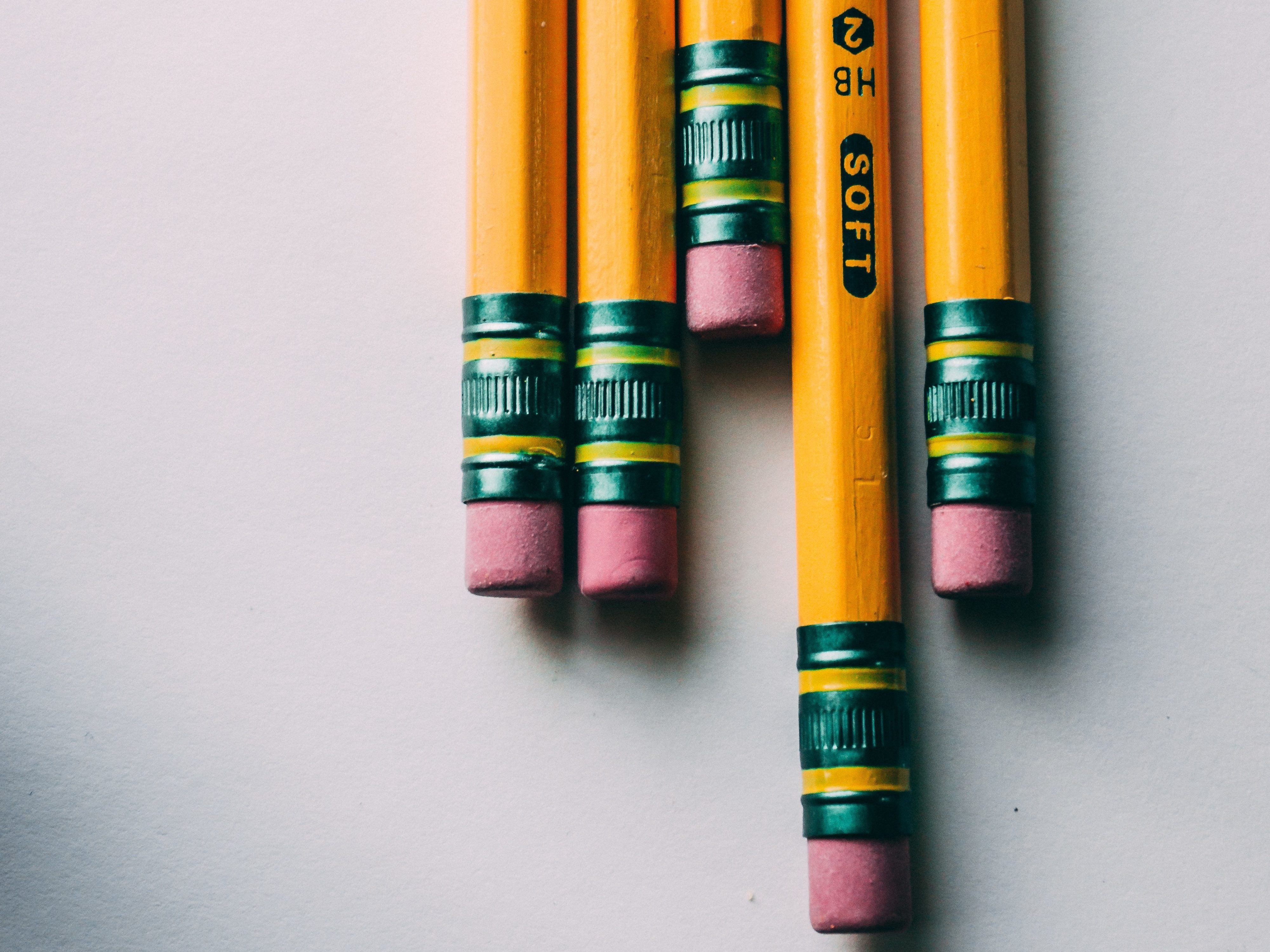 Photo of five yellow pencils